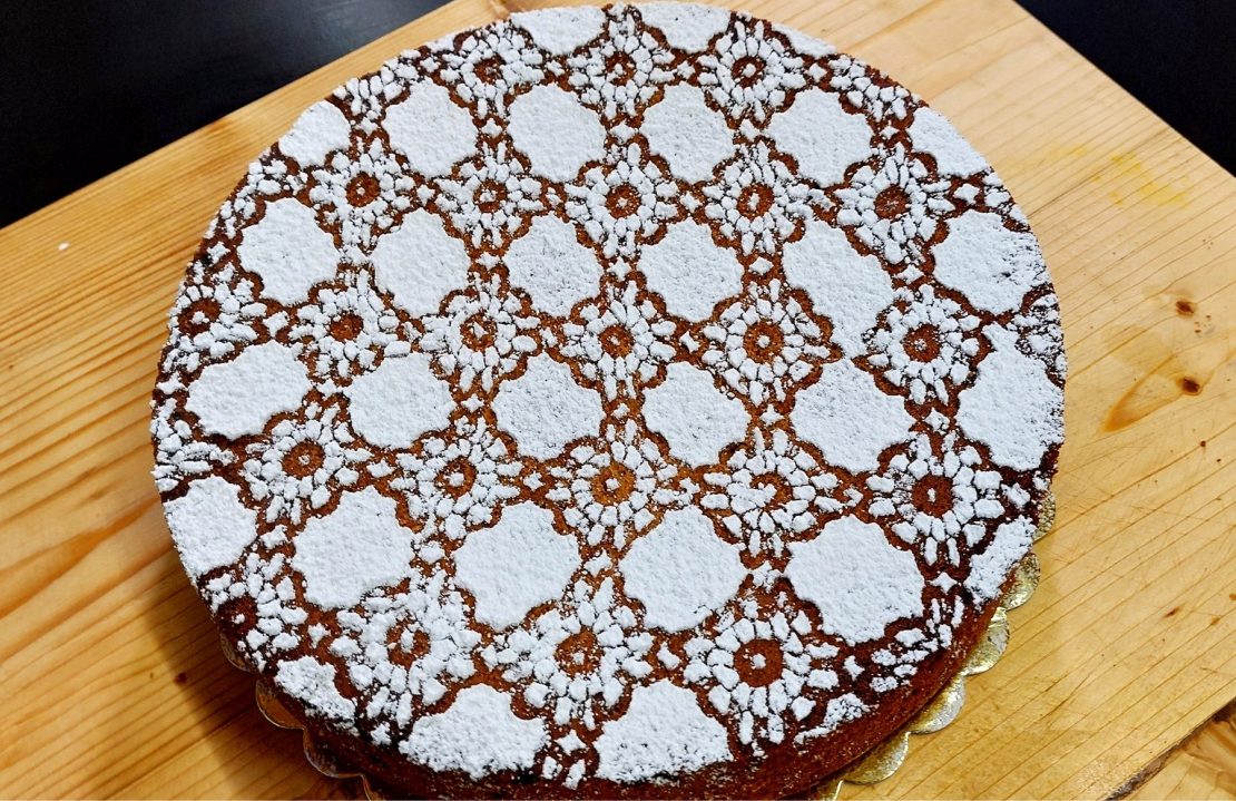 Fanouropita Greek fasting cake topped with icing sugar