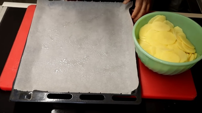 Step 2: line a baking pan with parchment paper and spray some cooking oil