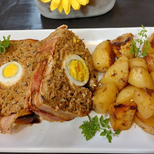 Egg Stuffed Meatloaf Wrapped in Bacon Slices