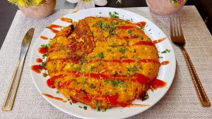 When time is short but you still want something warm, filling, and delicious, a 5-minute omelette is the answer. This quick recipe combines everyday ingredients—eggs, bacon, sausage, and cheese—into a satisfying meal that works any time of day, whether it's breakfast, lunch, or dinner.
The beauty of this omelette lies in its simplicity. With just a splash of water, some paprika, and a touch of salt and pepper, the eggs become light and flavorful. Browning the bacon and sausage slices first adds depth and a smoky aroma, while the cheese melts beautifully over the top, giving every bite a creamy finish. A final sprinkle of fresh parsley adds a burst of freshness that balances the richness.
Cooking on low heat is key for a fluffy and evenly cooked omelette. This method prevents the eggs from drying out and gives the cheese time to melt slowly. In just a few minutes, you’ll have a golden, perfectly cooked omelette with crispy edges and a gooey center.
Serve it on its own, with crusty bread, or alongside a salad for a balanced meal. This recipe is also easy to customize—add vegetables, herbs, or switch up the meat and cheese to your taste. It’s fast, flexible, and full of flavor—exactly what you need for busy days or lazy evenings.